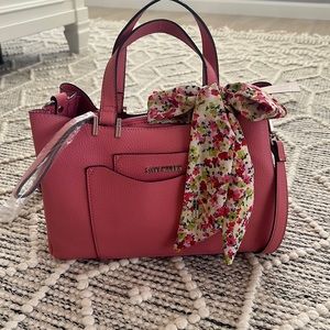 Adorable raspberry Steve Madden handbag.